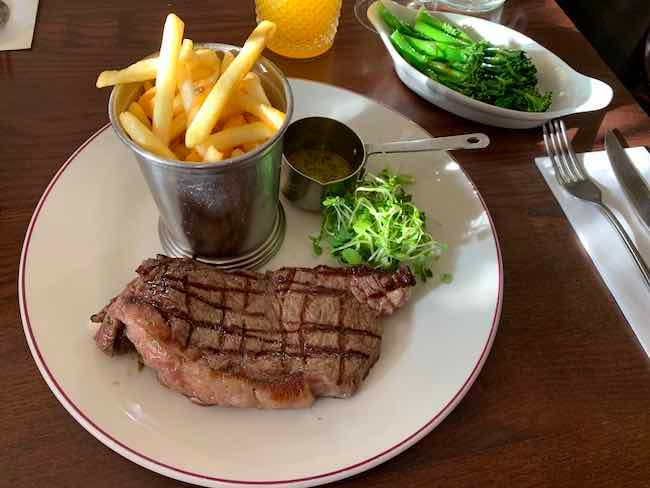 a photo of the 8oz Sirloin steak, chips and broccoli served at Cafe Rouge in St Kathryn Docks