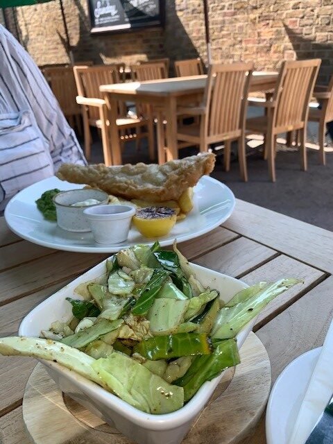 a photo of the summer greens side portion, with the fish and chips in the background, from The Windmill Clapham Common